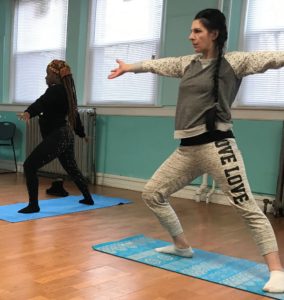 Residents at Southside Center of Hope participate in yoga